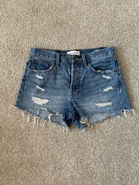 Aritzia - High- Rise Distressed Denim Shorts in Medium Blue